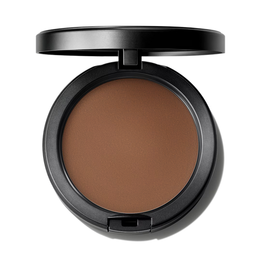 Compact brown powder in a black case on a white background